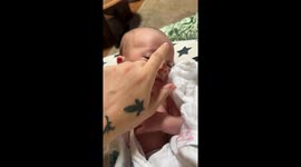 Newborn Baby's First Smile