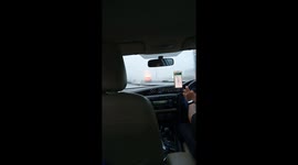 Driving in torrential downpour in Pattaya, Thailand, Asia