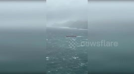 Bulk carrier battles through choppy seas during storm in Alaska