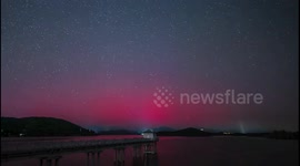 Northern lights illuminate Beijing’s Miyun Reservoir in China