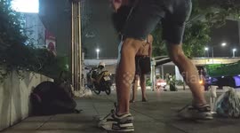 Good Samaritan barber gives hair cut to the homeless in Bangkok