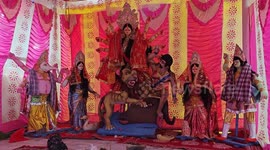 Hindu devotees immerse idols in river for Durga Puja festival