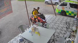 Passenger topples over while climbing down from motorcycle