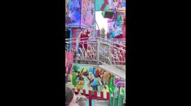 Woman Has Wardrobe Malfunction at Amusement Park