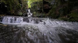 The famous Lumsdale falls in Matlock Derbyshire UK. 4K. Filmed in early autumn 2024