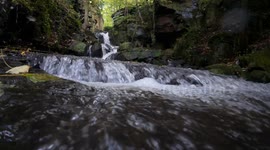 The famous Lumsdale falls in Matlock Derbyshire UK. 4K. Filmed in early autumn 2024