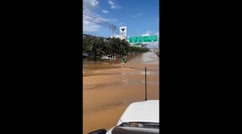 Deliveryman rides through floods to take meal home