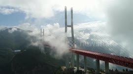 China: World's highest bridge in southwest China soars in popularity among tourists