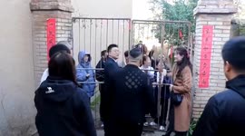 Brick wall collapses during scuffles at wedding in China