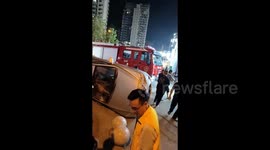 Locals flip car blocking fire engine's path to warehouse blaze in China