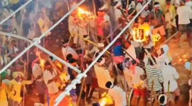 Religious festival descends into chaos as followers fight with sticks in India