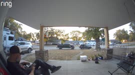 Man on Porch Watches Van Crash Into His Pickup