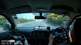 Pickup truck carrying hay bales SHUNTS motorcycle rider off the road