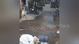 Hollow water tank lands on top of woman in India
