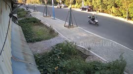 Motorcyclists crash into garden in Jiangsu Province, China