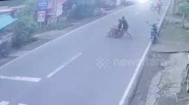 Motorcycle rider crashes into daughter rolling mother's wheelchair across road