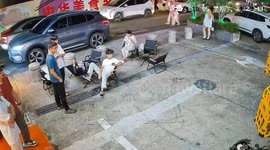 Scooter collides with parked car in Guangdong, China