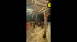 Flash flood surges into restaurant in Thailand