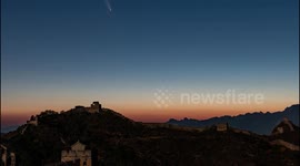 Time-lapse: comet streaks through night sky over China's Great Wall