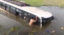 Bus overturns and lands in pond in India