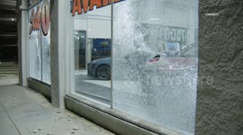 US, Los Angeles: Downtown Los Angeles Ford Dealership Window Smash