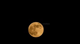 Time-lapse: full moon captured in SW China