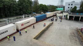 First China-Europe freight train for CIIE 2024 arrives in China's Shanghai