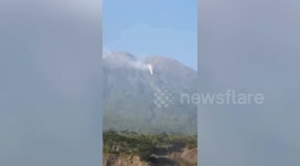 German tourist trapped during volcano fire is rescued in Indonesia