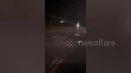 Floods surge through street in Roswell, New Mexico