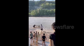 China: People Saved a Little Boy by the Yellow River