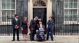 Keir Starmer buys poppy outside 10 Downing Street