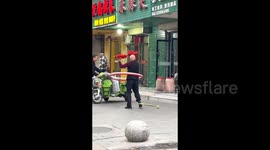 Elderly fitness fanatic shocks locals as he spins handkerchiefs, hula hoops, and ball simultaneously