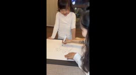 Creative 6-year-old transforms mom’s doodles into space scene in China