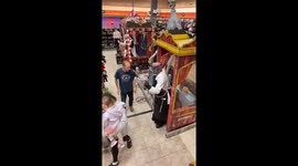I pretend to be an animatronic in Halloween stores and give the guys and ghouls and fright!