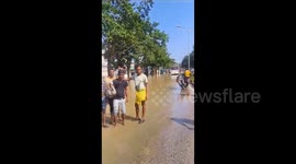 India: Bengaluru Residents Catch Fish On Waterlogged Streets