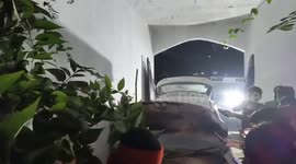 Giant python found under car's bonnet in India