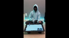 Guy Flips Highlighter Onto A Bottle Flip
