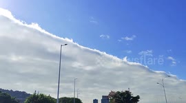 Sky above Chinese province divided by huge shelf cloud