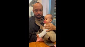 Child spits out pacifier for a bite in São Paulo