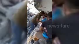 Palestine: Locals saved Palestinian journalist Tareq Daqs from the rubble of his home in Jabalia refugee camp following Israeli strike