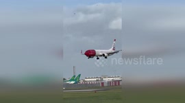 Plane lands in strong winds at Dublin International Airport in Ireland