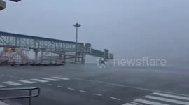 Tropical Storm Trami batters airport runway in the Philippines