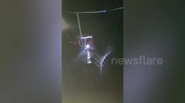 Coast guards save dozens stranded from homes amid Tropical Storm Trami