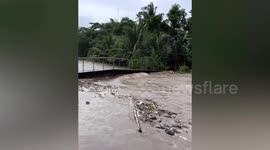 River swells from Tropical Storm Trami floods