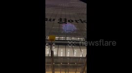 US: Protesters gathered outside the New York Times building and projected