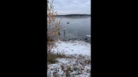 Man Rescues Dog Stuck in Frozen Lake