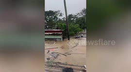 Flood swallows homes as Severe Tropical Storm Trami batters the Philippines