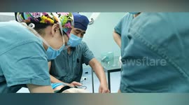 Surgeons remove yellow diamond from child's EAR in China