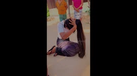 Watch how a traditional Burmese hair bun is tied