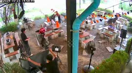 Tree collapses onto restaurant during storm in Thailand